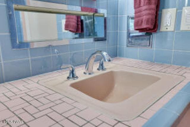 312 E Ann St, Milford, PA 18337 - bathroom featuring tasteful backsplash and vanity
