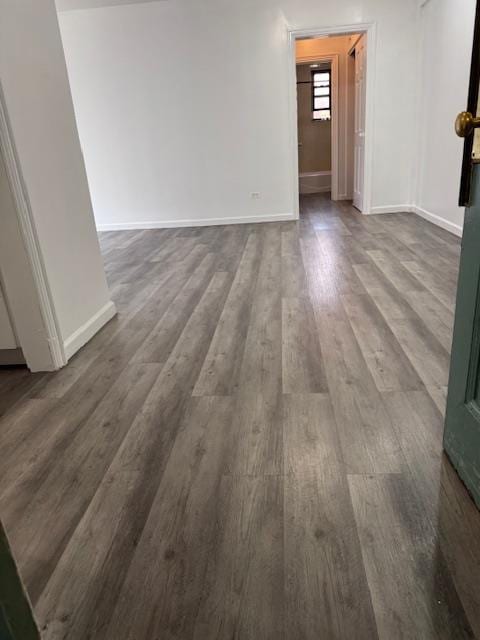 44-16 Macnish St Unit 5B, Elmhurst, NY 11373 - spare room featuring dark wood-style flooring