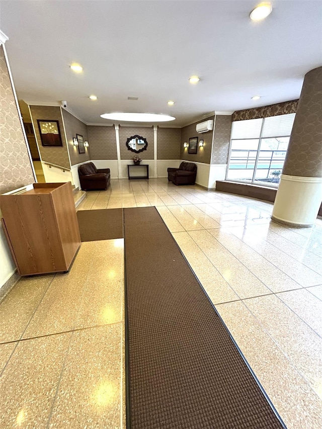 81-11 45th Ave Unit 3, Elmhurst, NY 11373 - building lobby with recessed lighting, ornamental molding, and a surveillance system