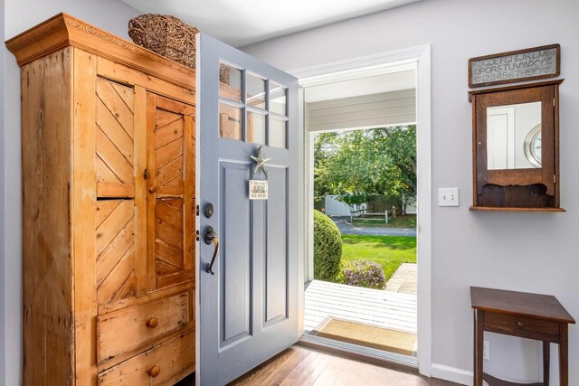 91 Howell St, Southampton, NY 11968 - entryway with wood finished floors and baseboards