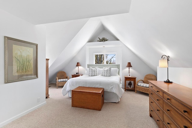 91 Howell St, Southampton, NY 11968 - bedroom with light colored carpet and vaulted ceiling