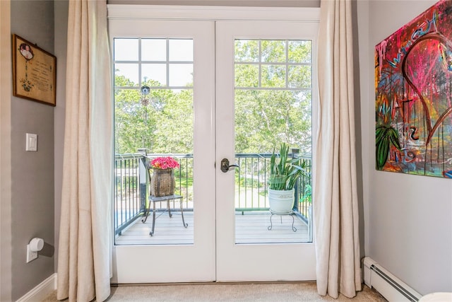 5 Hildreth Rd S, Hampton Bays, NY 11946 - doorway with baseboard heating and french doors