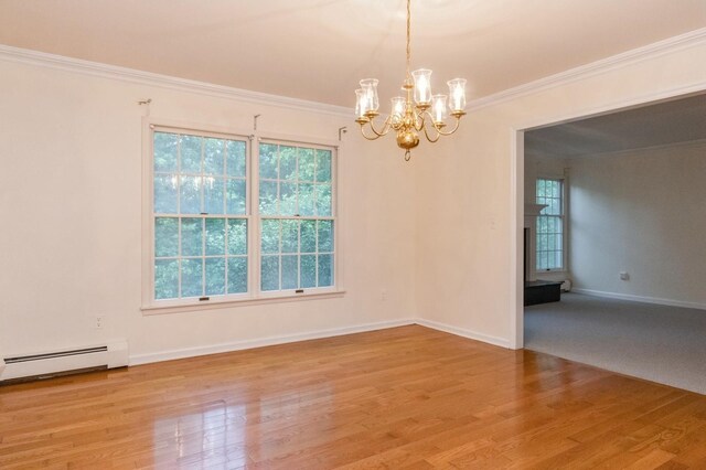 2 Demarest Rd, Chestnut Ridge, NY 10977 - unfurnished room featuring baseboard heating, a chandelier, ornamental molding, light wood-type flooring, and plenty of natural light