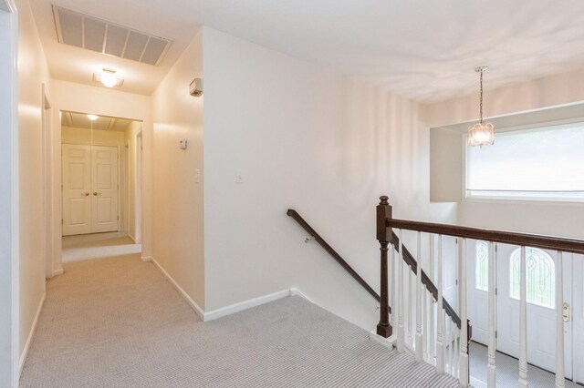 2 Demarest Rd, Chestnut Ridge, NY 10977 - corridor featuring attic access, an upstairs landing, and light colored carpet