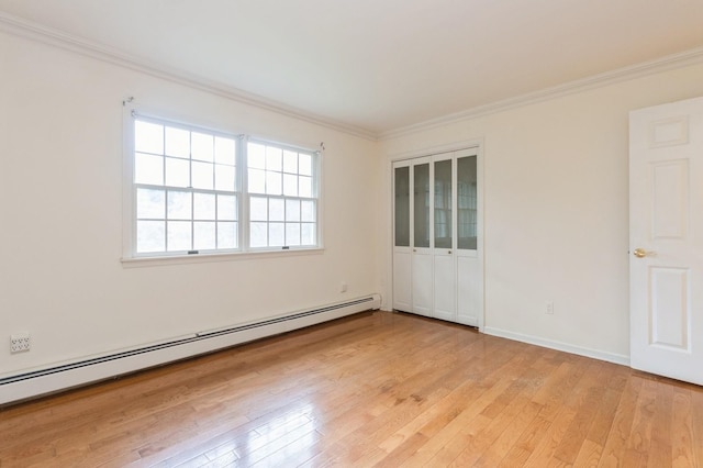 2 Demarest Rd, Chestnut Ridge, NY 10977 - empty room with a baseboard radiator, light wood finished floors, and crown molding