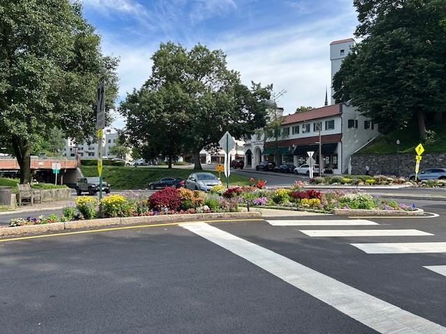 56 Pondfield Rd W Unit 4A, Bronxville, NY 10708 - view of asphalt road with traffic signs and curbs