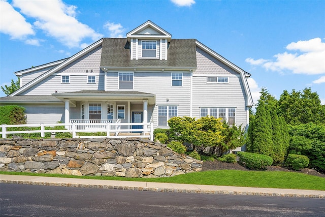 402 Waterview Dr, Poughkeepsie, NY 12601 - view of front of house with roof with shingles, a porch, and an attached garage