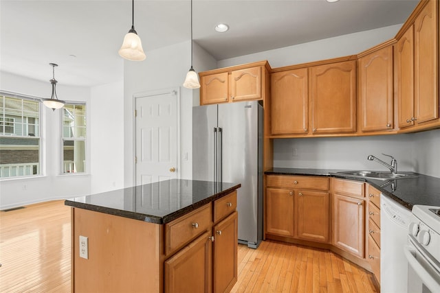 402 Waterview Dr, Poughkeepsie, NY 12601 - kitchen with freestanding refrigerator, light wood finished floors, pendant lighting, white dishwasher, and a center island