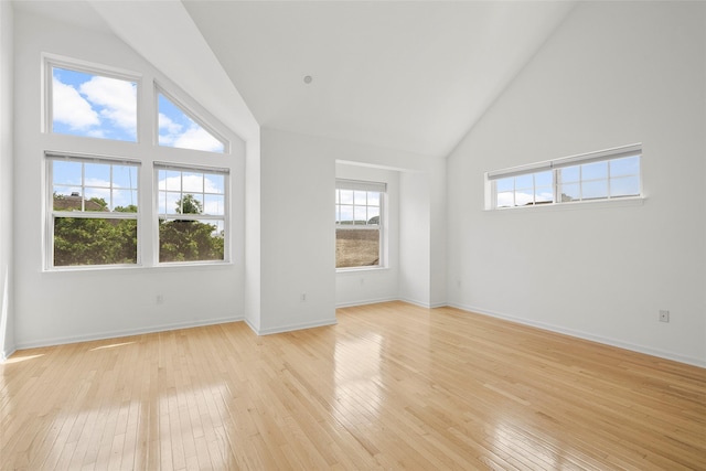 402 Waterview Dr, Poughkeepsie, NY 12601 - empty room featuring high vaulted ceiling and light wood finished floors