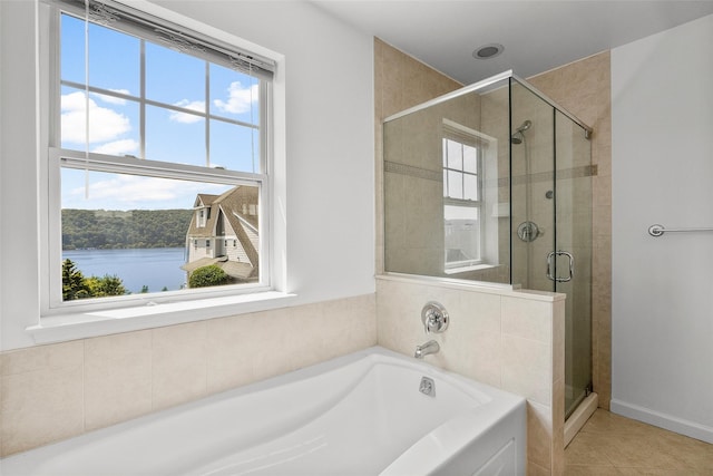 402 Waterview Dr, Poughkeepsie, NY 12601 - bathroom with plenty of natural light, a bath, a stall shower, and tile patterned floors