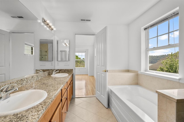 402 Waterview Dr, Poughkeepsie, NY 12601 - full bath with a bath, double vanity, and tile patterned floors