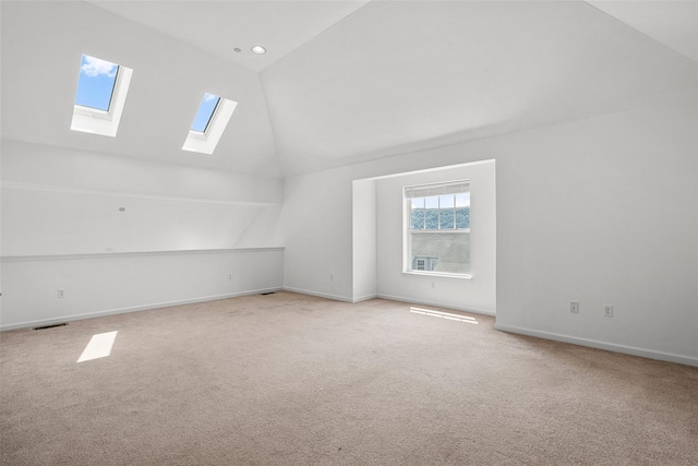 402 Waterview Dr, Poughkeepsie, NY 12601 - additional living space featuring a skylight, carpet flooring, and high vaulted ceiling