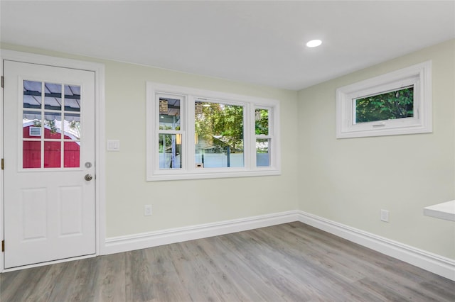23 Eastport Dr, Sound Beach, NY 11789 - foyer with wood finished floors and recessed lighting