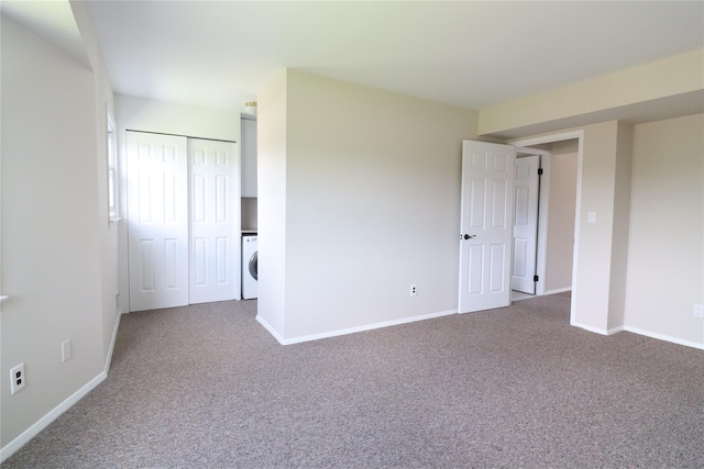 18 Hastings Ct Unit E, Yorktown Heights, NY 10598 - unfurnished bedroom with washer / dryer, carpet, and a closet