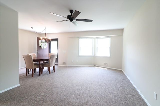 18 Hastings Ct Unit E, Yorktown Heights, NY 10598 - unfurnished dining area with a chandelier, carpet, and ceiling fan