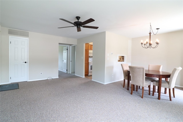 18 Hastings Ct Unit E, Yorktown Heights, NY 10598 - dining area featuring a chandelier, carpet, and a ceiling fan