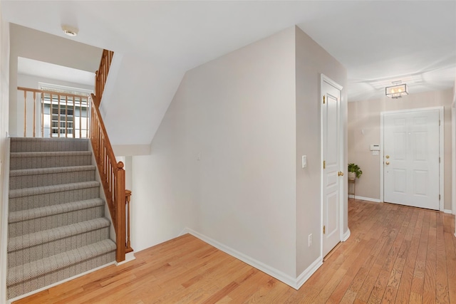 15 Deertree Ln, Briarcliff Manor, NY 10510 - stairs featuring hardwood / wood-style flooring and baseboards