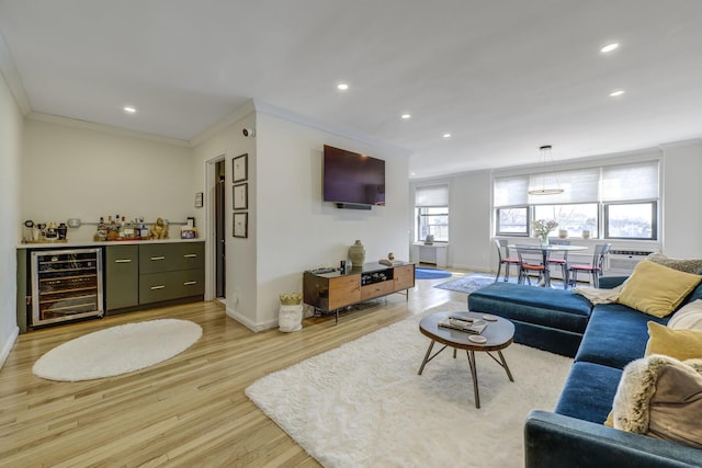 5 Birchwood Ct Unit 4N, Mineola, NY 11501 - living area featuring wine cooler, a bar, crown molding, light wood-type flooring, and recessed lighting