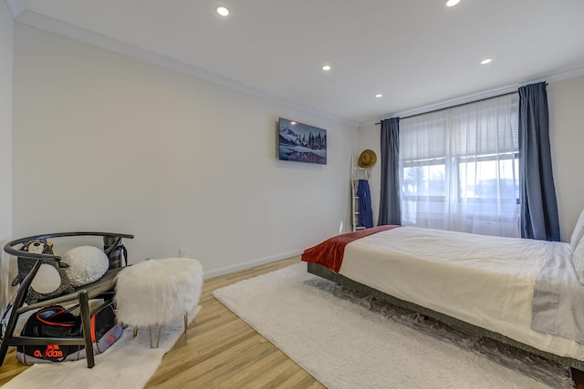 5 Birchwood Ct Unit 4N, Mineola, NY 11501 - bedroom featuring recessed lighting, light wood-style floors, and crown molding