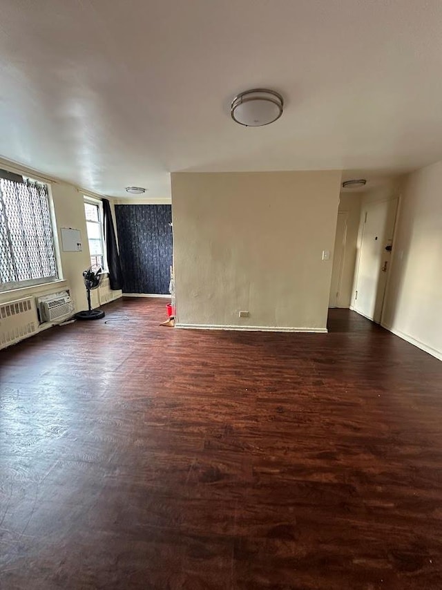 2385 Barker Ave Unit 6B, Bronx, NY 10467 - unfurnished room featuring dark wood-type flooring and a wall unit AC