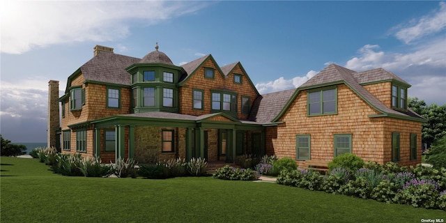 63 Lake Rd, Manhasset, NY 11030 - rear view of house with covered porch and a yard