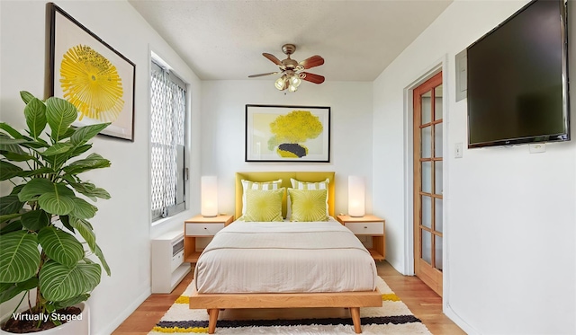 8420 153rd Ave Unit 6H, Howard Beach, NY 11414 - bedroom featuring light wood-style floors and a ceiling fan