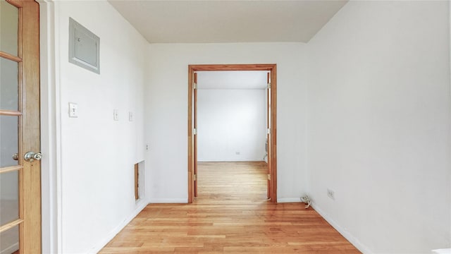 8420 153rd Ave Unit 6H, Howard Beach, NY 11414 - hallway with light wood finished floors and baseboards