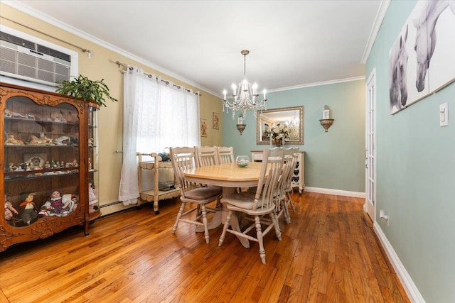 2 Croydon Dr, North Bellmore, NY 11710 - dining space with a chandelier, hardwood / wood-style flooring, ornamental molding, and a wall mounted air conditioner
