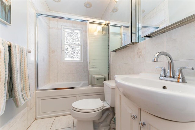 2 Croydon Dr, North Bellmore, NY 11710 - bathroom featuring enclosed tub / shower combo, vanity, tile patterned flooring, and tile walls