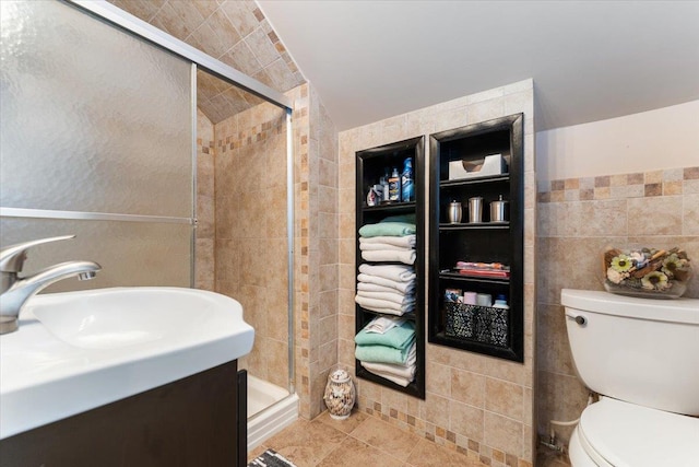 2 Croydon Dr, North Bellmore, NY 11710 - bathroom with tile walls, a stall shower, tile patterned flooring, and vanity