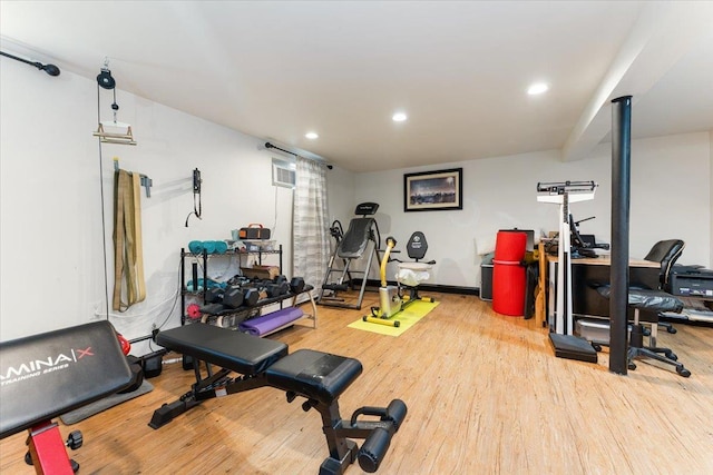 2 Croydon Dr, North Bellmore, NY 11710 - exercise area featuring wood finished floors, recessed lighting, and a baseboard heating unit