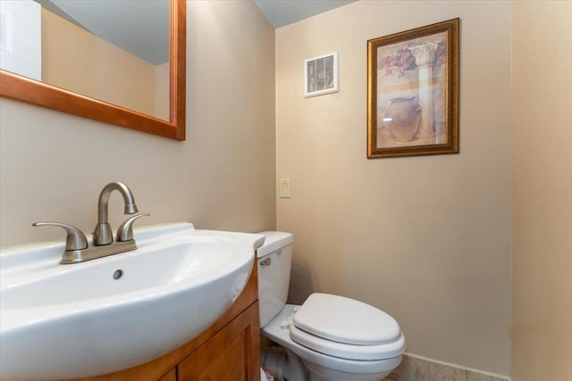 2 Croydon Dr, North Bellmore, NY 11710 - bathroom with toilet and vanity
