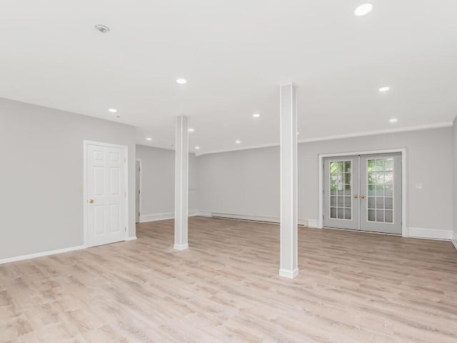 237 Brady Ave, Hawthorne, NY 10532 - below grade area with light wood-style flooring, recessed lighting, french doors, and ornamental molding
