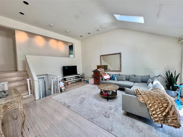 48 Marlene Dr, Syosset, NY 11791 - living room with wood-type flooring, a skylight, and lofted ceiling