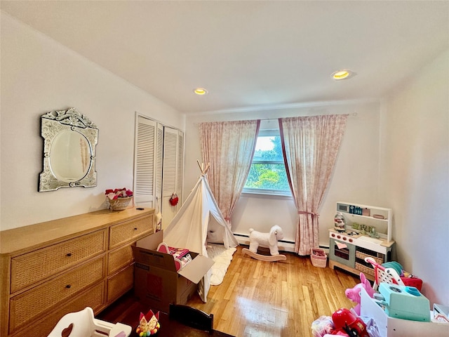 48 Marlene Dr, Syosset, NY 11791 - playroom featuring wood finished floors and recessed lighting