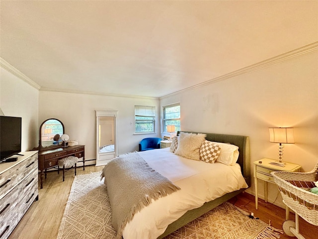 48 Marlene Dr, Syosset, NY 11791 - bedroom with ornamental molding, light wood finished floors, and a baseboard radiator