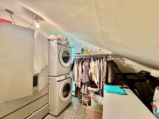 48 Marlene Dr, Syosset, NY 11791 - washroom featuring stacked washer / dryer and a textured ceiling