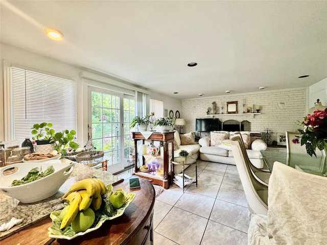48 Marlene Dr, Syosset, NY 11791 - living area featuring brick wall and light tile patterned floors