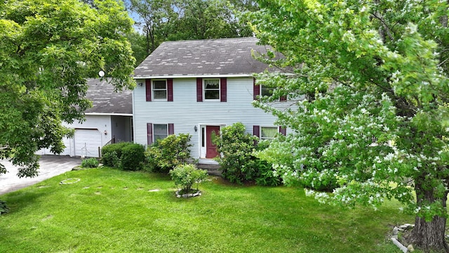 2 Gerri Ct, Wallkill, NY 12589 - colonial-style house with a shingled roof, a front yard, driveway, and a garage