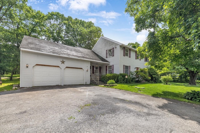 2 Gerri Ct, Wallkill, NY 12589 - colonial-style house featuring a garage, a front lawn, and asphalt driveway