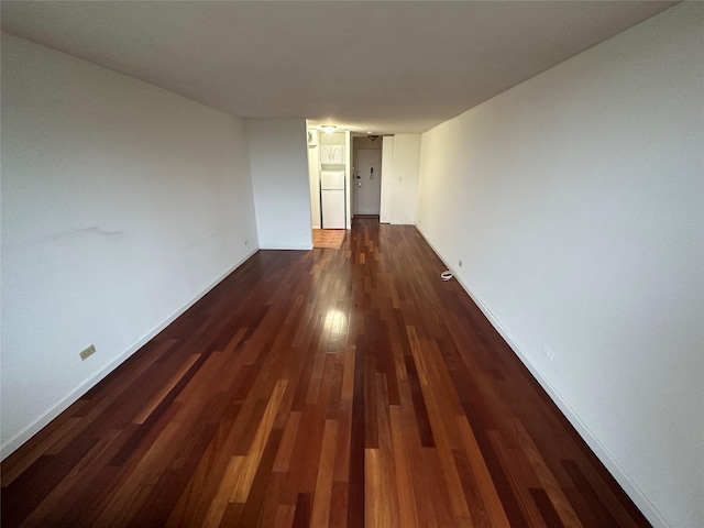 15038 Union Tpke Unit 3D, Kew Garden Hills, NY 11367 - hallway featuring dark wood finished floors and baseboards