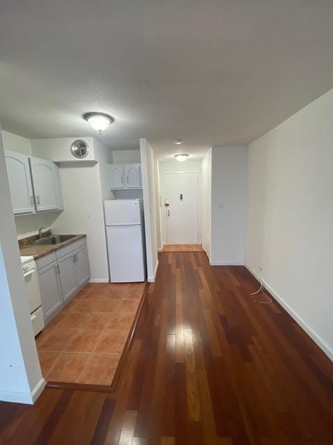15038 Union Tpke Unit 3D, Kew Garden Hills, NY 11367 - kitchen featuring freestanding refrigerator, range, and wood finished floors
