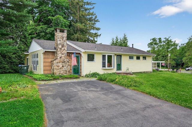 11 Seth Dr, New Hampton, NY 10958 - ranch-style house with a front lawn, a chimney, and roof with shingles