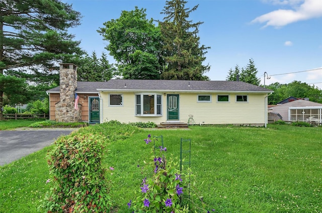 11 Seth Dr, New Hampton, NY 10958 - ranch-style home featuring a front lawn, a chimney, and driveway