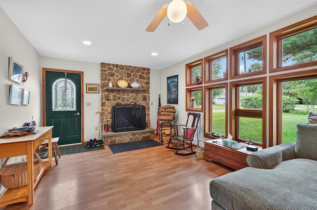 11 Seth Dr, New Hampton, NY 10958 - living room with wood finished floors, a fireplace, a ceiling fan, and recessed lighting