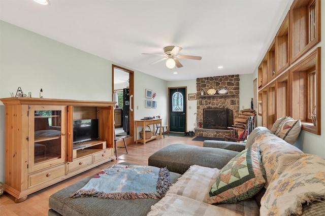 11 Seth Dr, New Hampton, NY 10958 - living room with ceiling fan, a stone fireplace, light wood-style floors, and recessed lighting