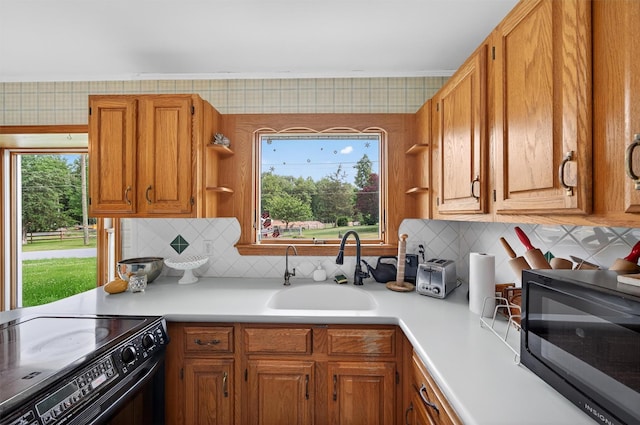 11 Seth Dr, New Hampton, NY 10958 - kitchen featuring black appliances, open shelves, light countertops, and backsplash