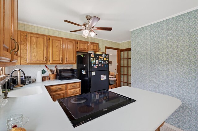 11 Seth Dr, New Hampton, NY 10958 - kitchen featuring black appliances, wallpapered walls, a ceiling fan, light countertops, and ornamental molding