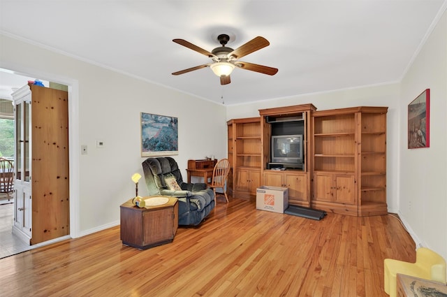 11 Seth Dr, New Hampton, NY 10958 - living area featuring light wood finished floors, a ceiling fan, and ornamental molding