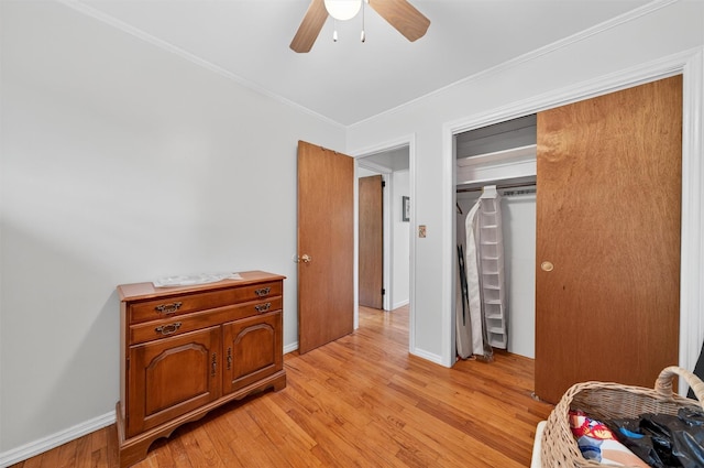 11 Seth Dr, New Hampton, NY 10958 - bedroom featuring light wood finished floors, a closet, ornamental molding, and a ceiling fan